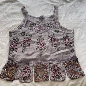 Purple embroidered tank top.